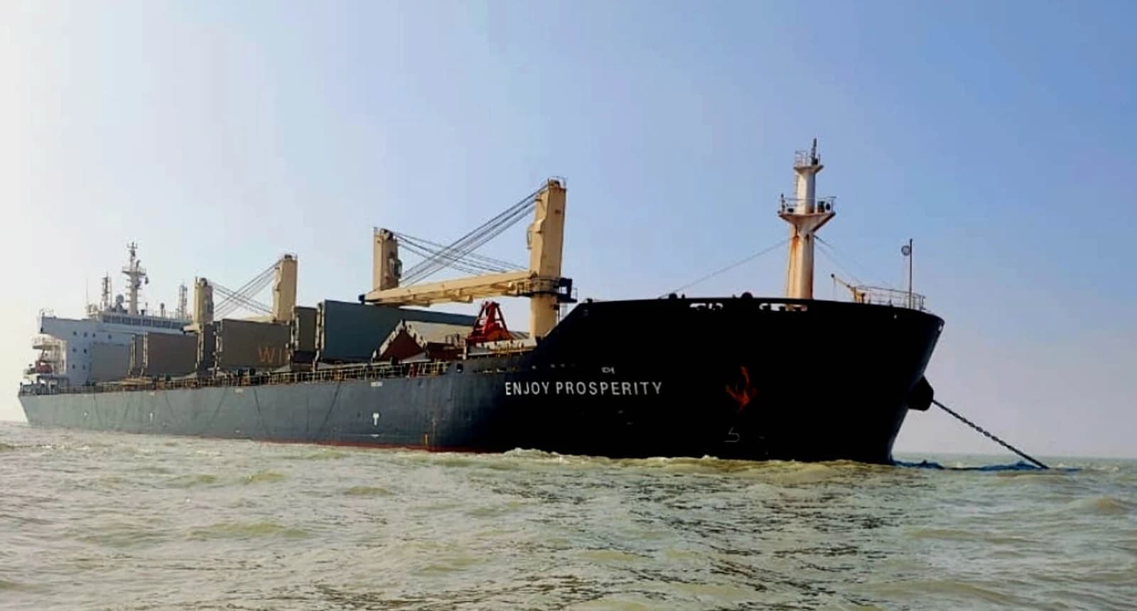 Cargo ship MV Enjoy Prosperity anchored at Kutubdia, Chittagong Port, Bangladesh.