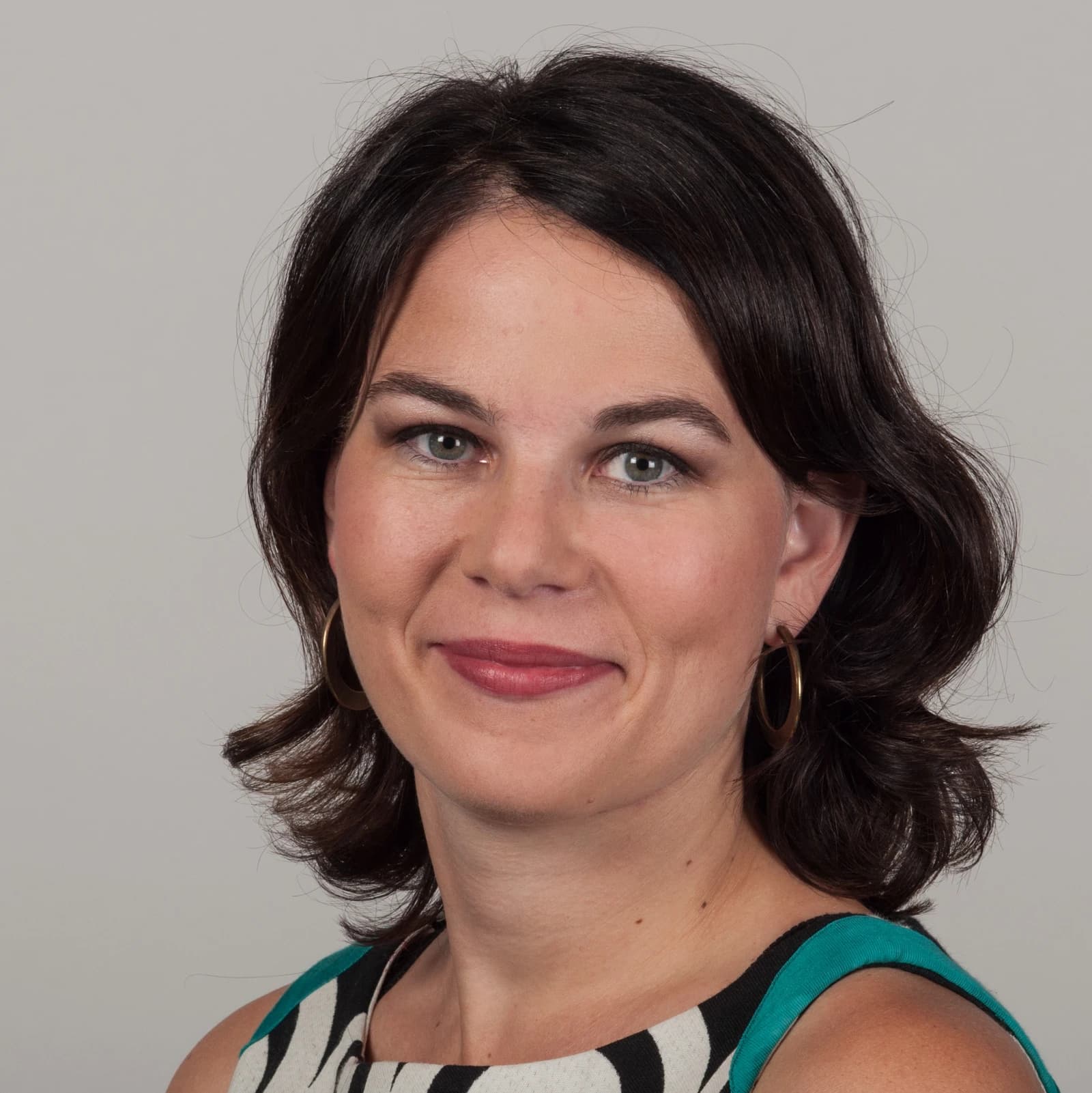 Annalena Baerbock, German politician, looking directly at the camera in a headshot.