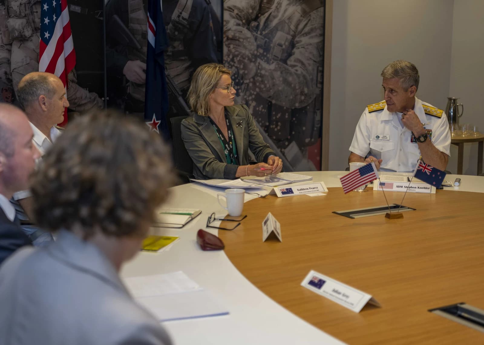 ADM Stephen Koehler and Kathleen Pearce at a meeting with other officials.