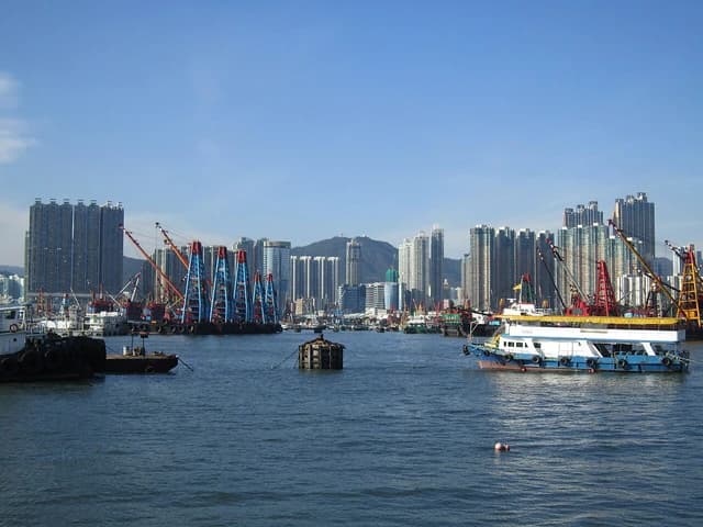 View of numerous residential and commercial buildings along the Tai Kok Tsui waterfront, Hong Kong.
