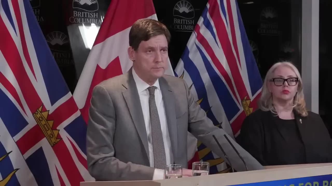 David Eby and Nina Krieger at a press conference in Tumbler Ridge, British Columbia.