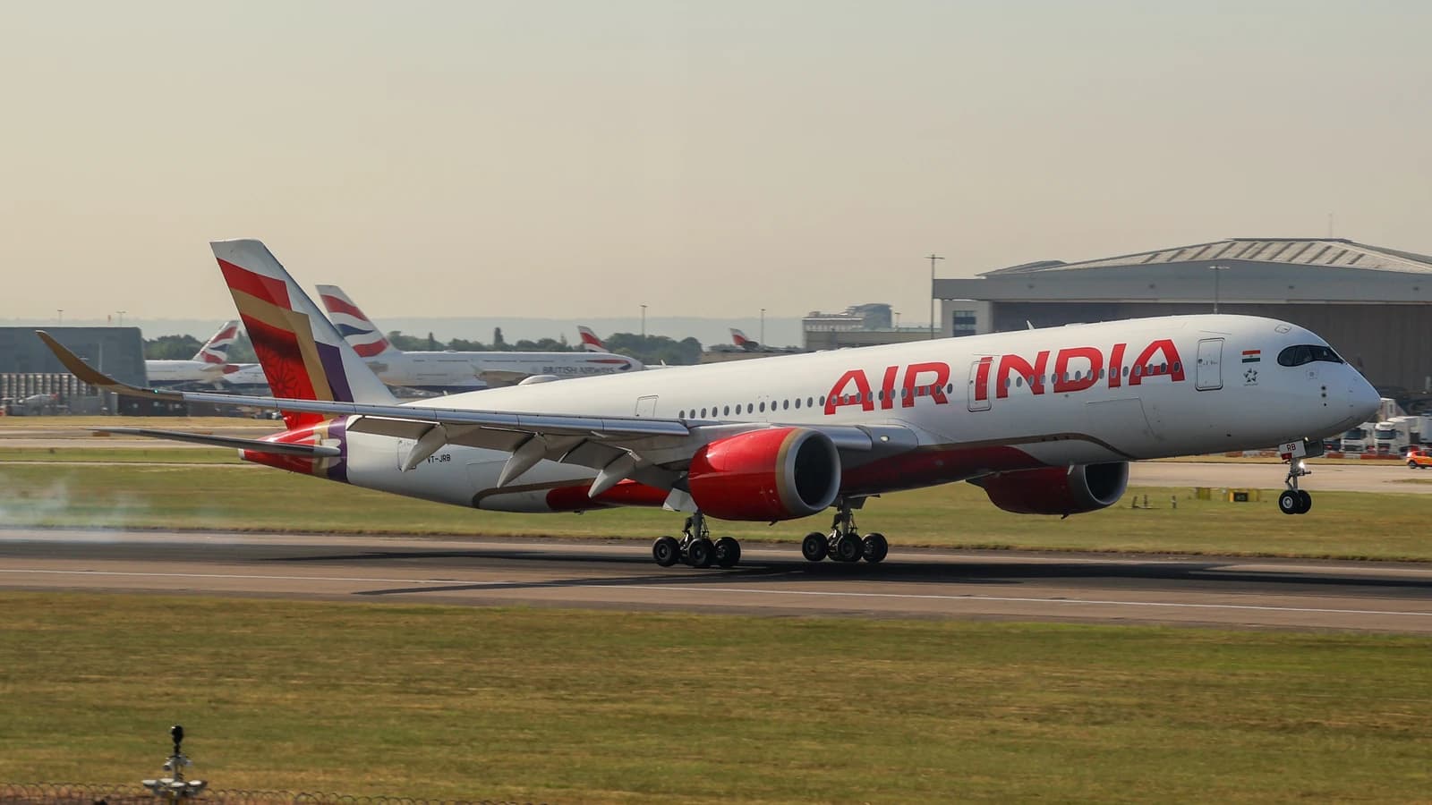 An Air India Airbus A350-941 VT-JRB aircraft on a runway at London Heathrow Airport.