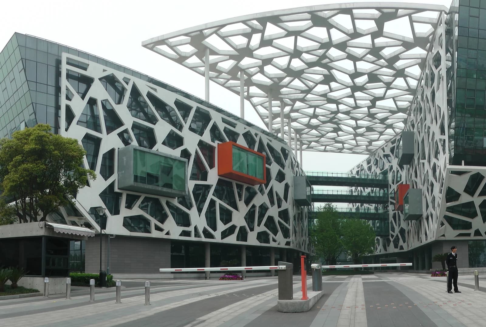 Exterior view of Alibaba Group Headquarters with modern architectural design.