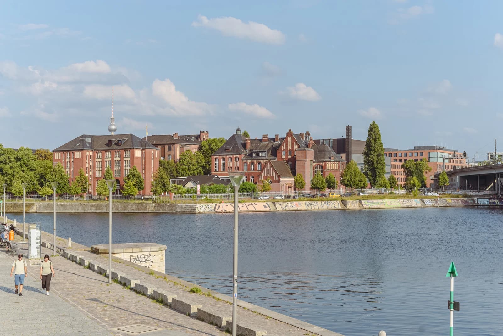 Buildings of Campus Charité Mitte seen from across the Spree River in Berlin.