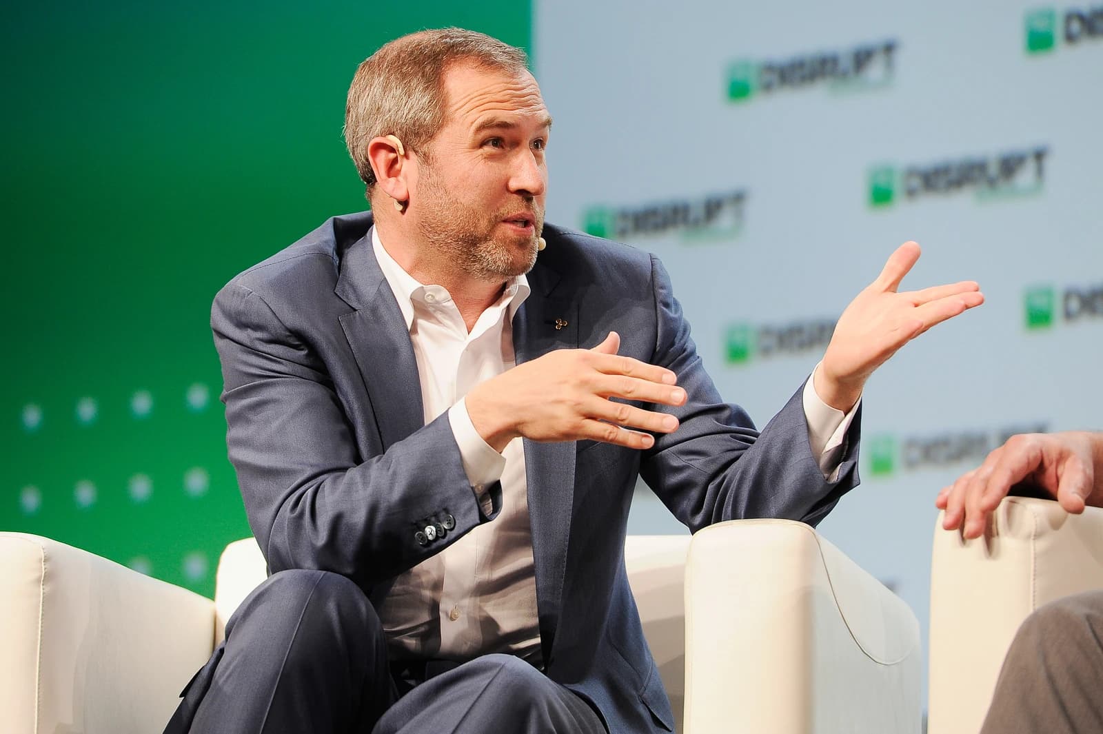 Brad Garlinghouse, CEO of Ripple, speaking at a conference.