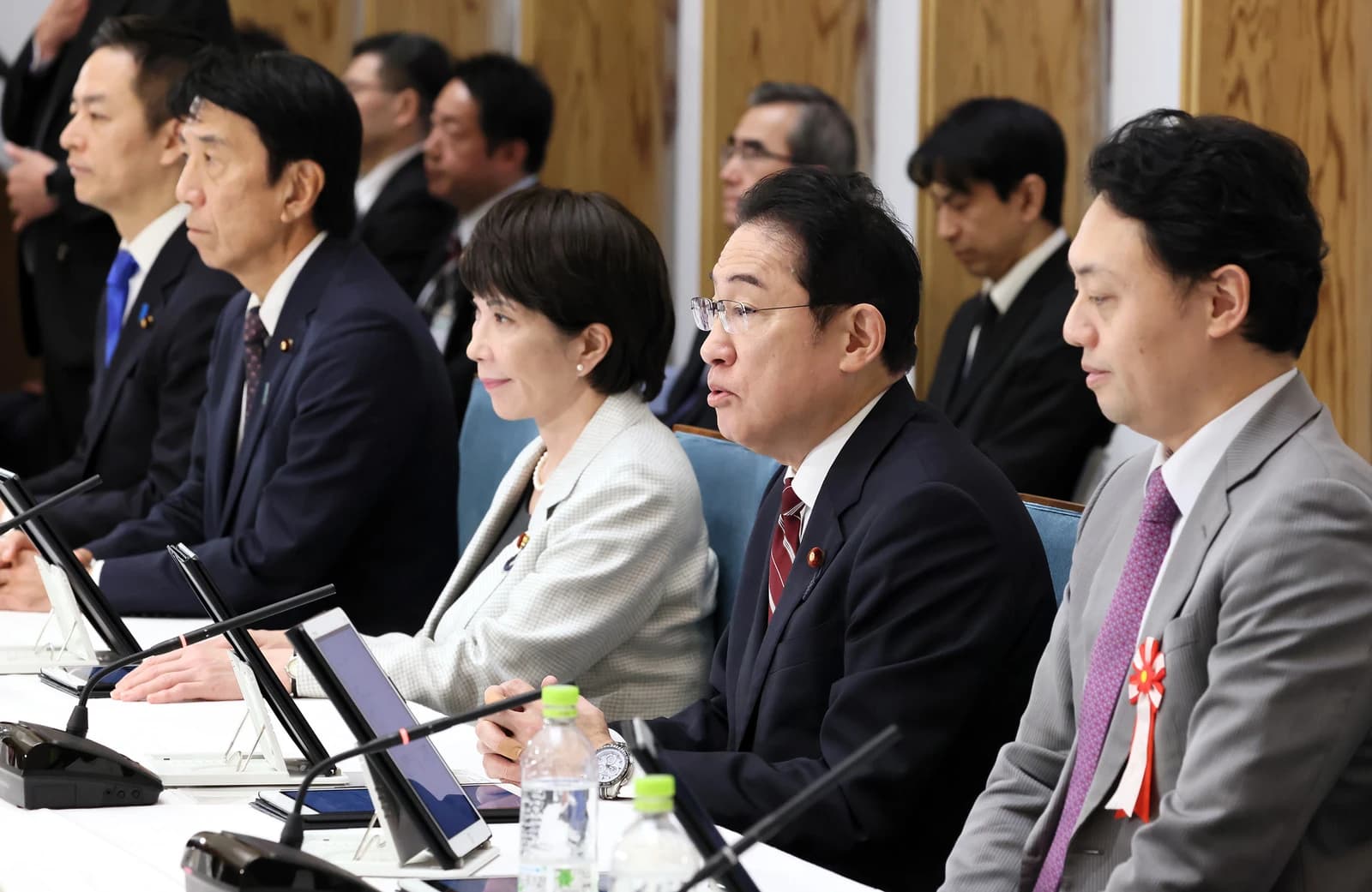 Fumio Kishida, Prime Minister of Japan, at a meeting with other Japanese officials.