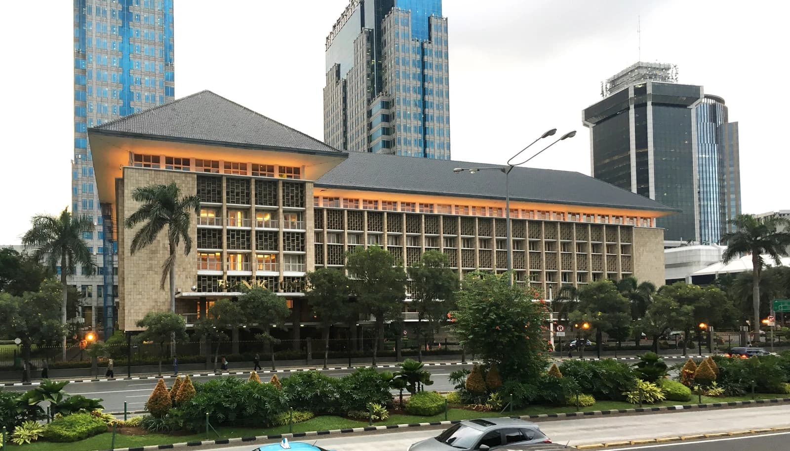 Bank Indonesia Lama building, a grand stone structure with a tiled roof.