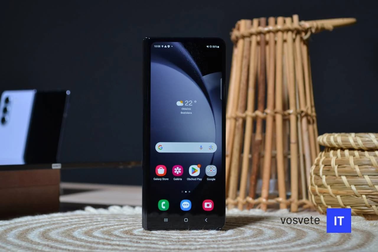 Samsung Galaxy Z Fold 5 smartphone shown vertically on a textured mat.
