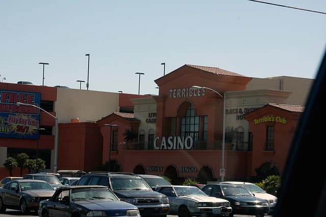 Terrible's Casino building exterior with prominent 'CASINO' sign, with cars parked in front.