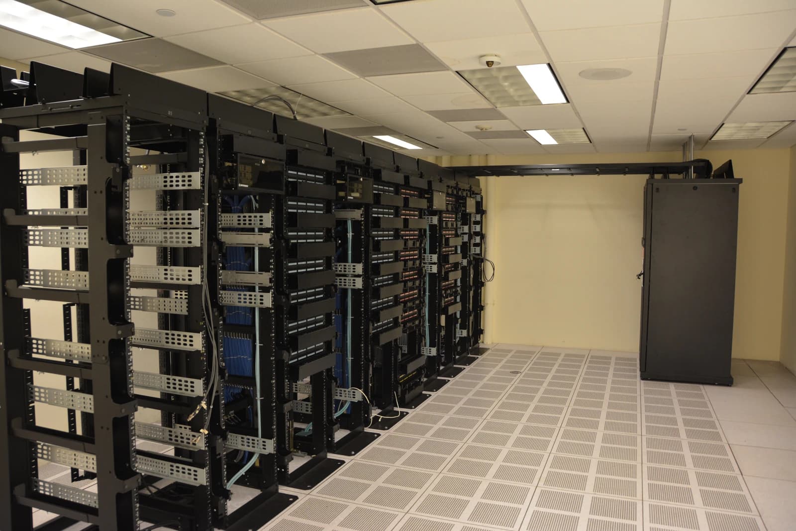 Empty server racks with cabling in a data center.