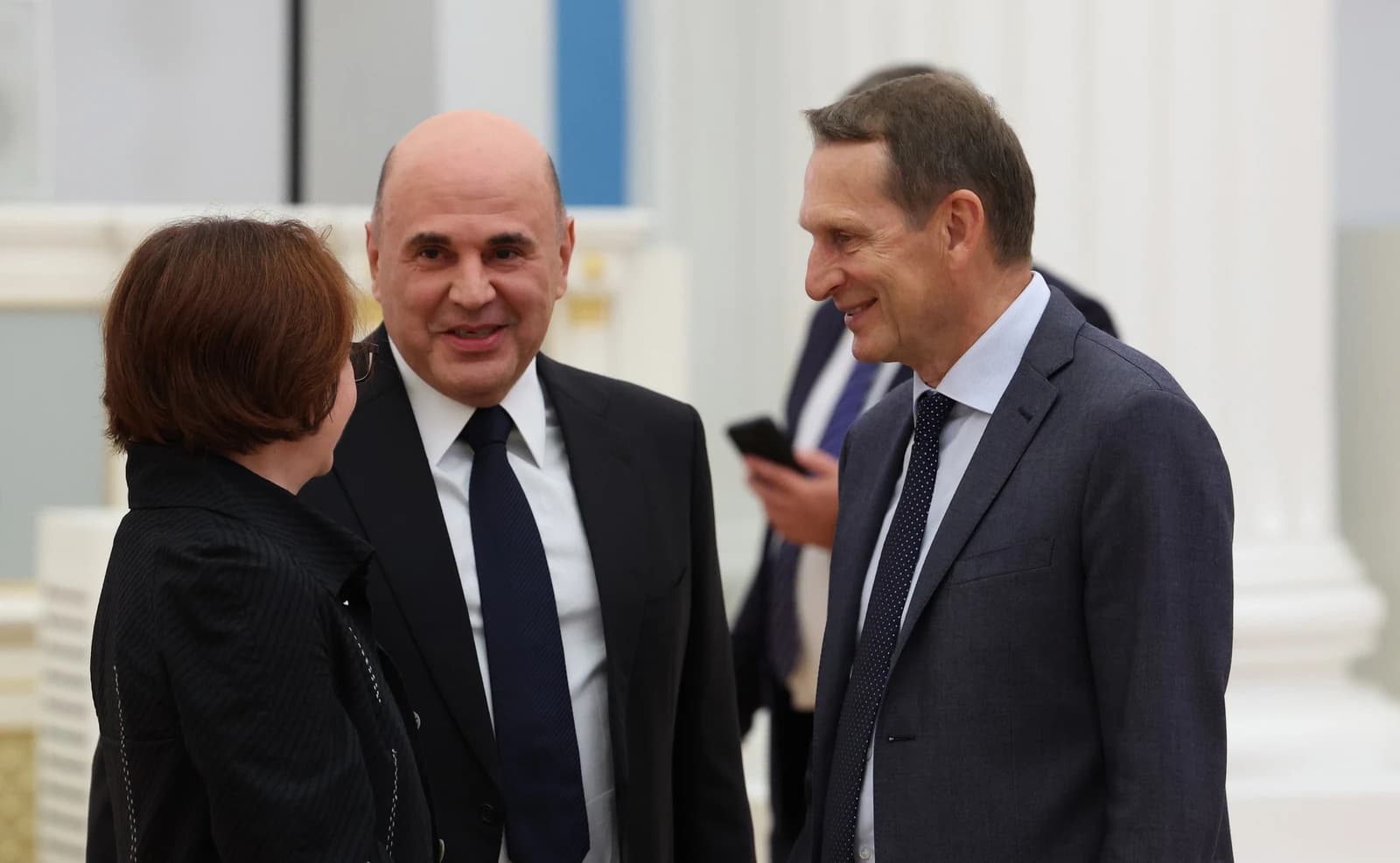 Elvira Nabiullina, Governor of the Bank of Russia, speaks with Mikhail Mishustin and Sergey Naryshkin.