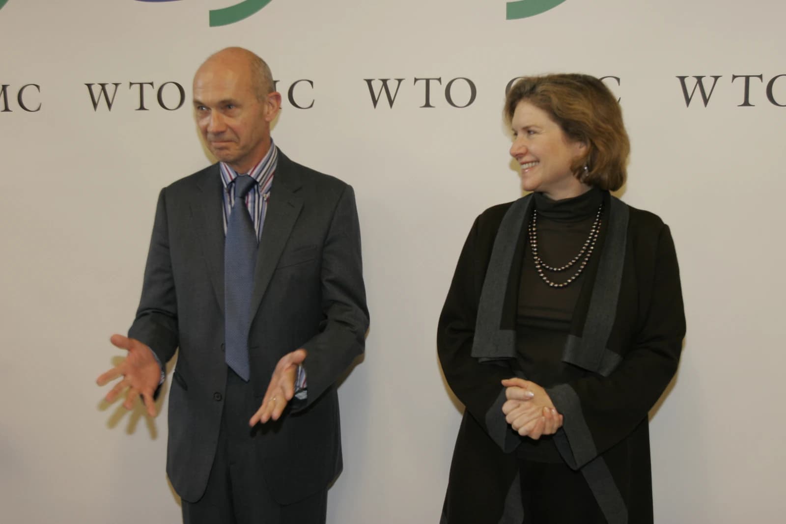 Susan Schwab, U.S. Trade Representative, and Pascal Lamy, WTO Director-General, standing indoors.