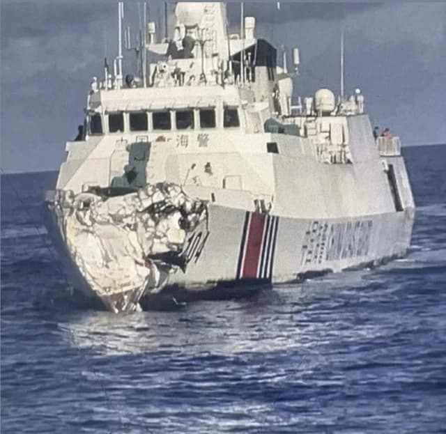 China Coast Guard Cutter Nanyu (3104) at sea with significant damage to its bow.