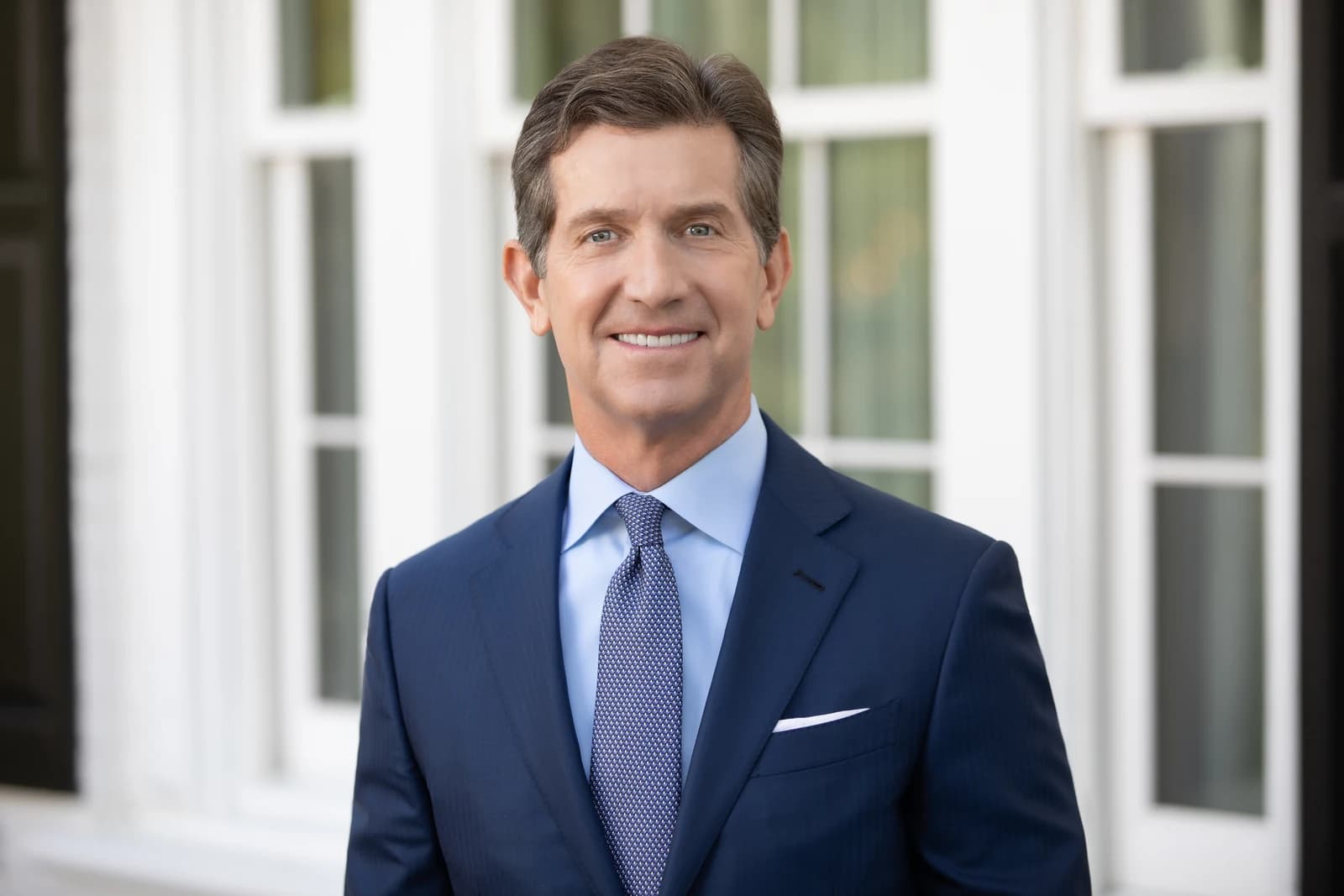 Alex Gorsky, former CEO of Johnson & Johnson, smiles at the camera.