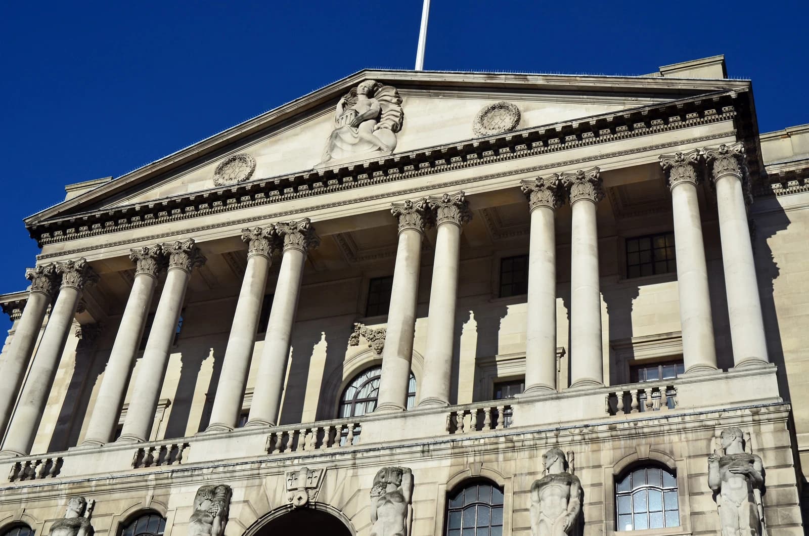 Bank of England building with large columns on Threadneedle Street, London.