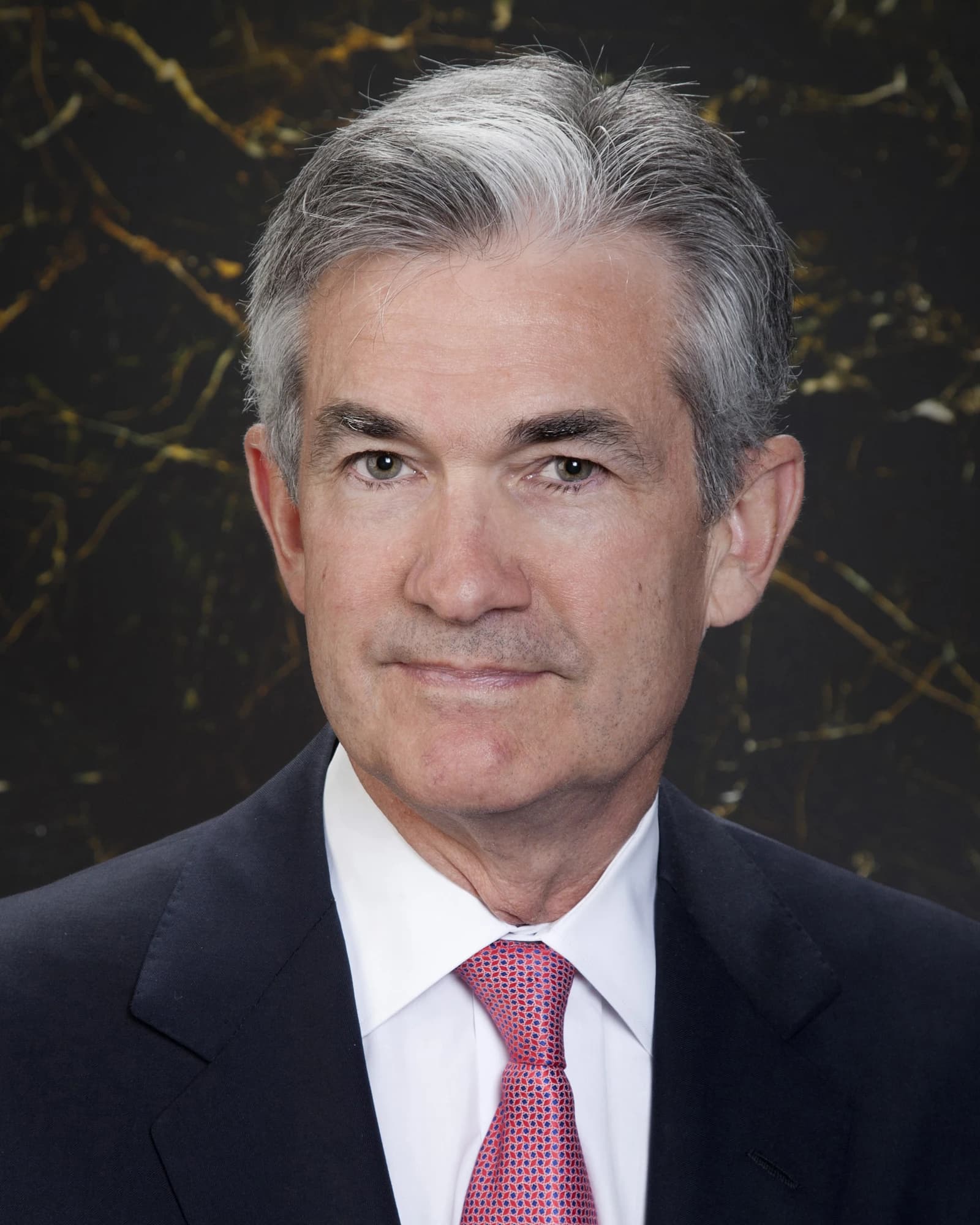 Jerome H. Powell, Chair of the Federal Reserve, looking directly at the camera.