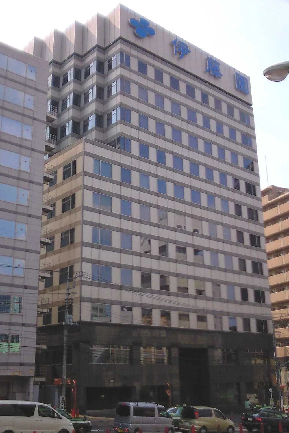 ITO EN corporate building in Japan with blue logo and Japanese text.