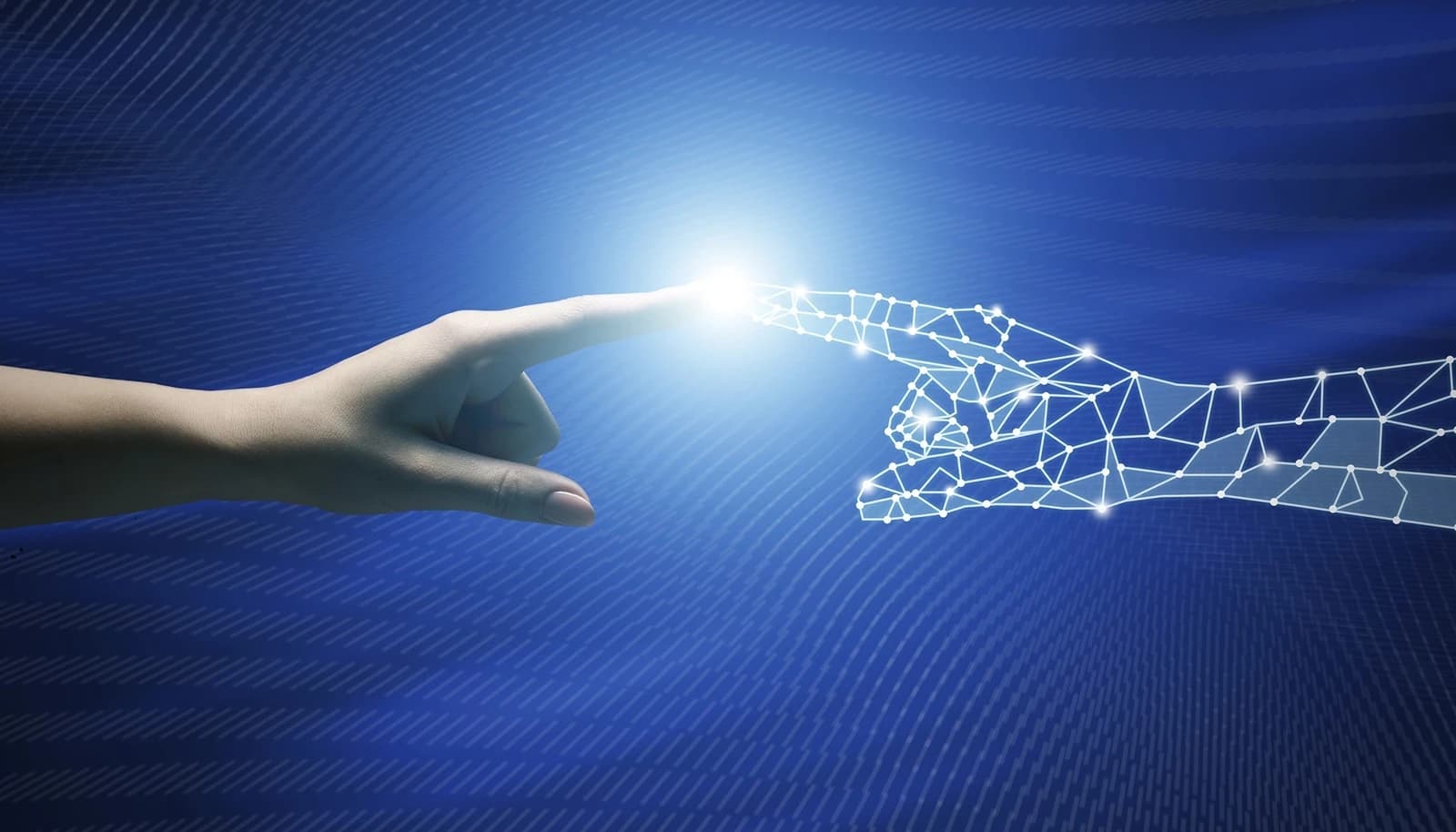Human hand and digital hand meeting with light burst.