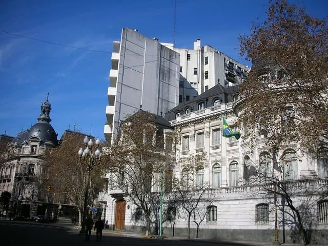Exterior of the Embassy of Brazil in Argentina, a grand classical building with a Brazilian flag.
