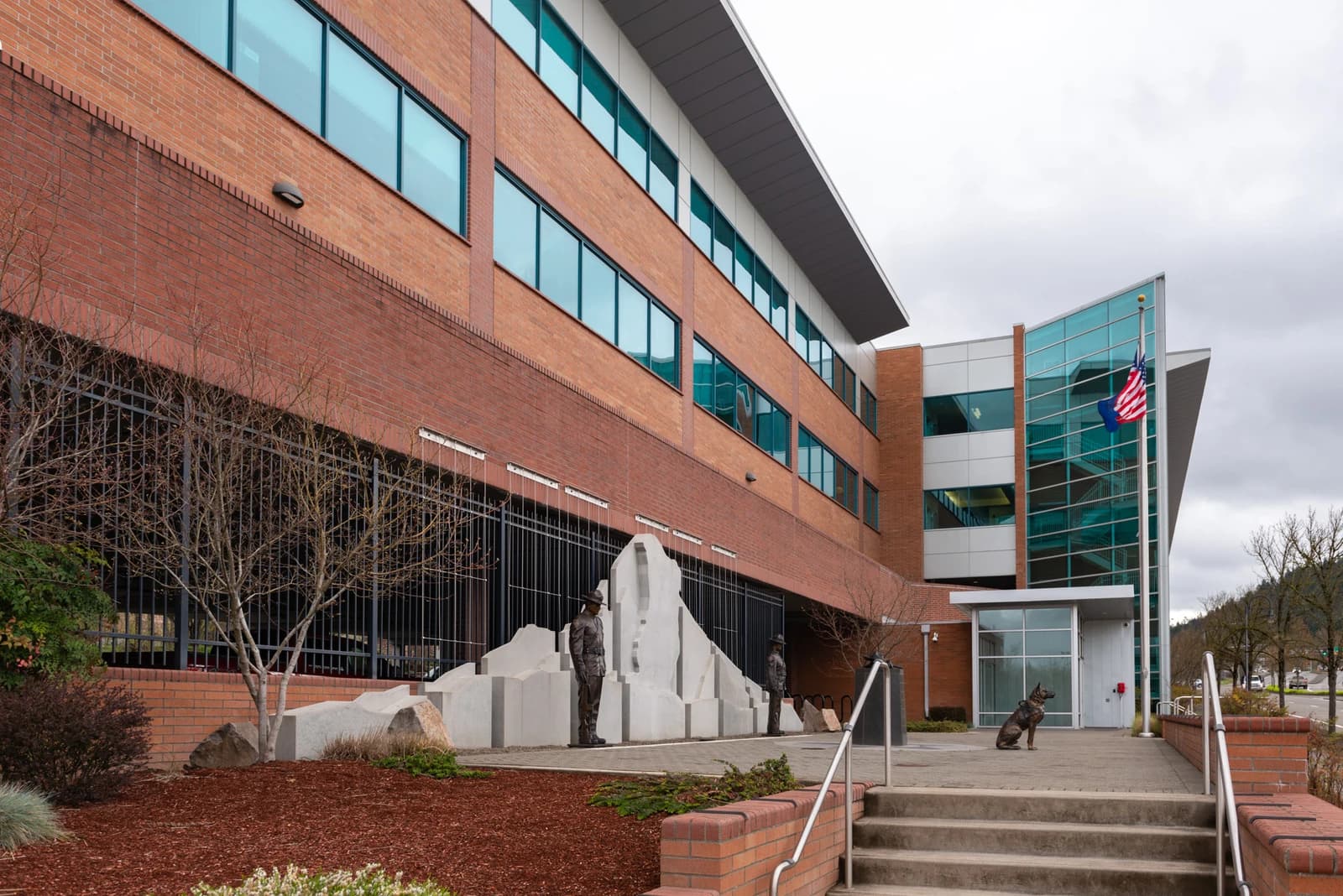 Exterior of the Clackamas County Sheriff's Office building, showing the brick facade and entrance.