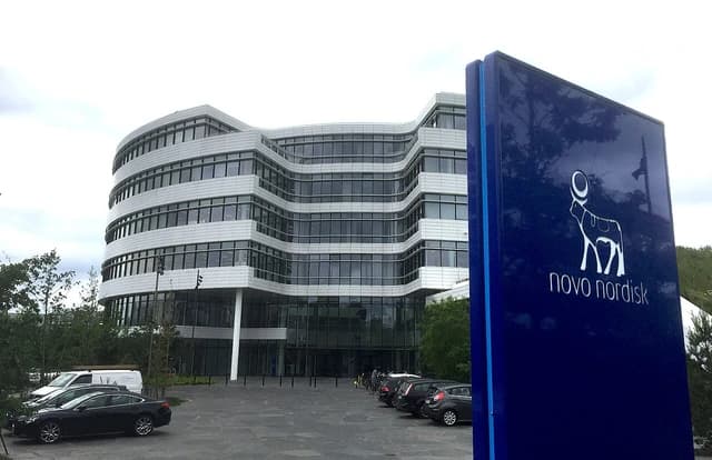 Novo Nordisk headquarters building in Denmark on an overcast day.