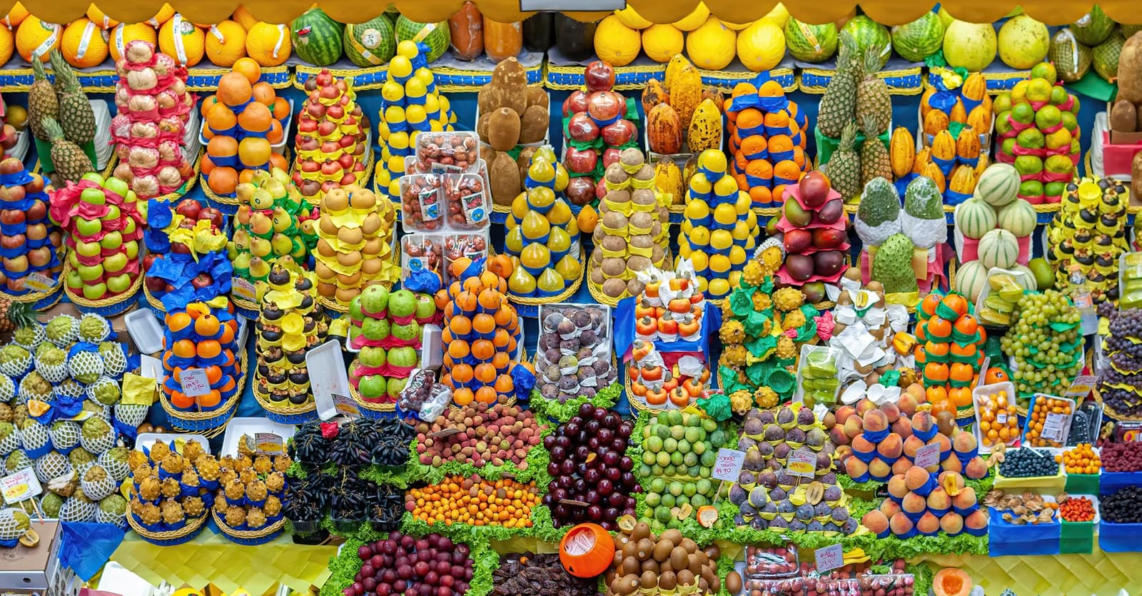 A vibrant assortment of fresh fruits displayed at the Municipal Market in São Paulo.