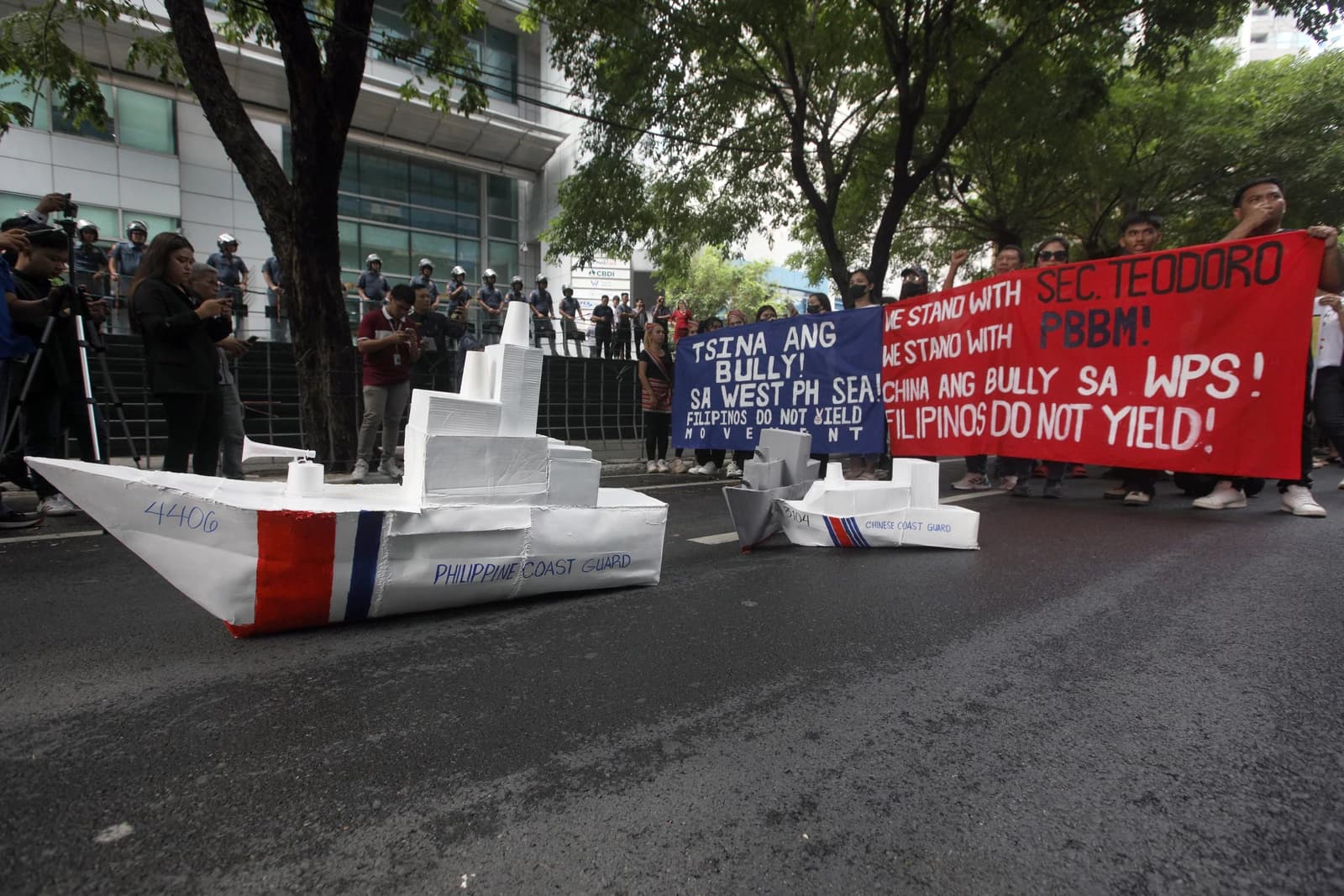 Members of the Filipinos Do Not Yield Movement protest outside the Chinese Embassy.