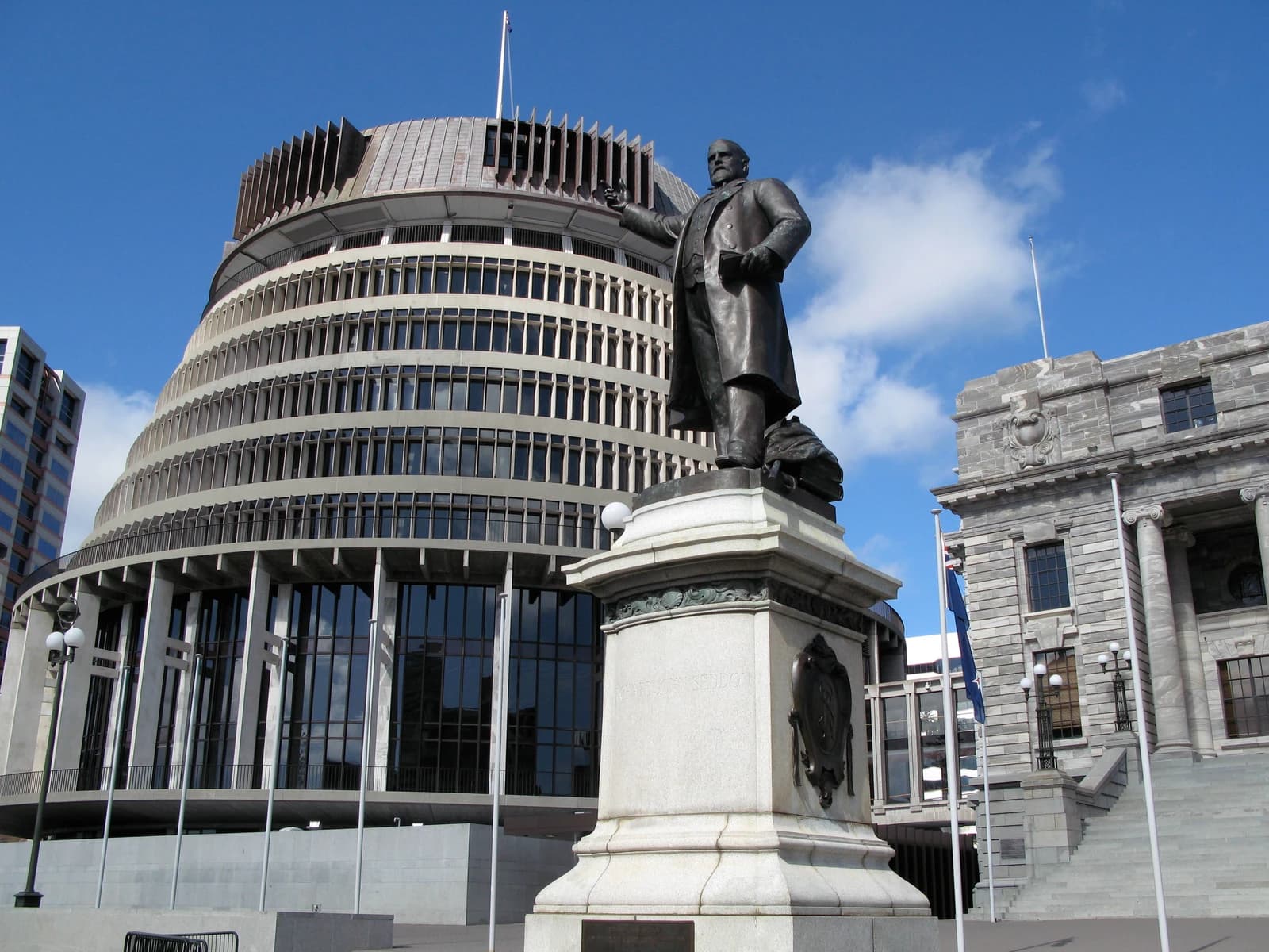 The Beehive Building, New Zealand's Parliament executive wing, under a blue sky.