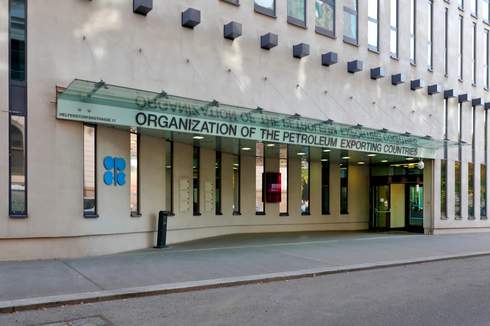 Exterior of the OPEC headquarters building with its logo and name visible on the facade.