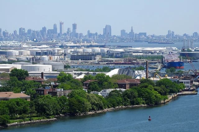 Aerial view of Bayonne tank farm with storage tanks and industrial facilities.