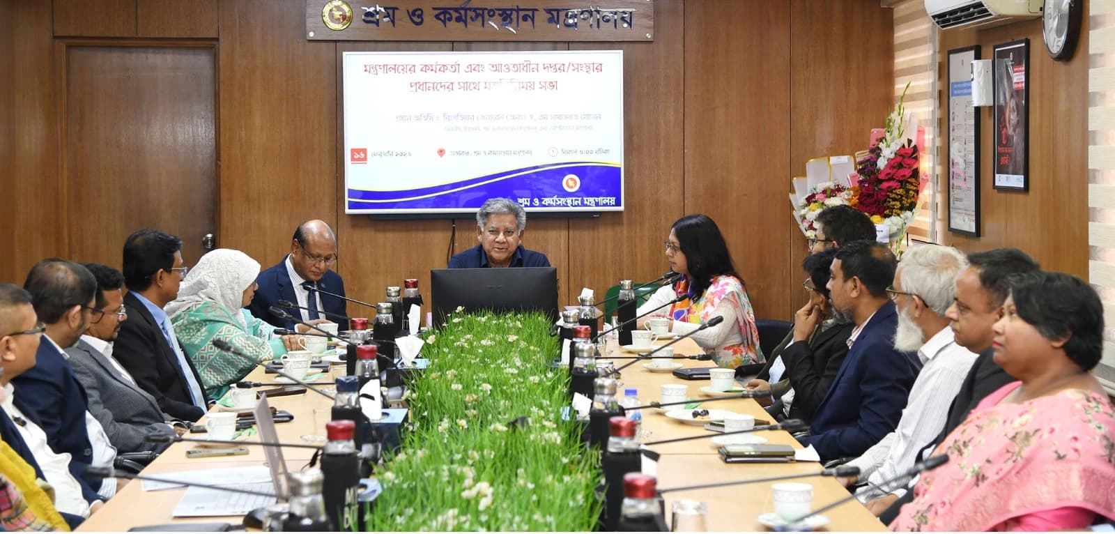 M. Sakhawat Hossain, Advisor for Shipping and Labor and Employment, speaking at a meeting.