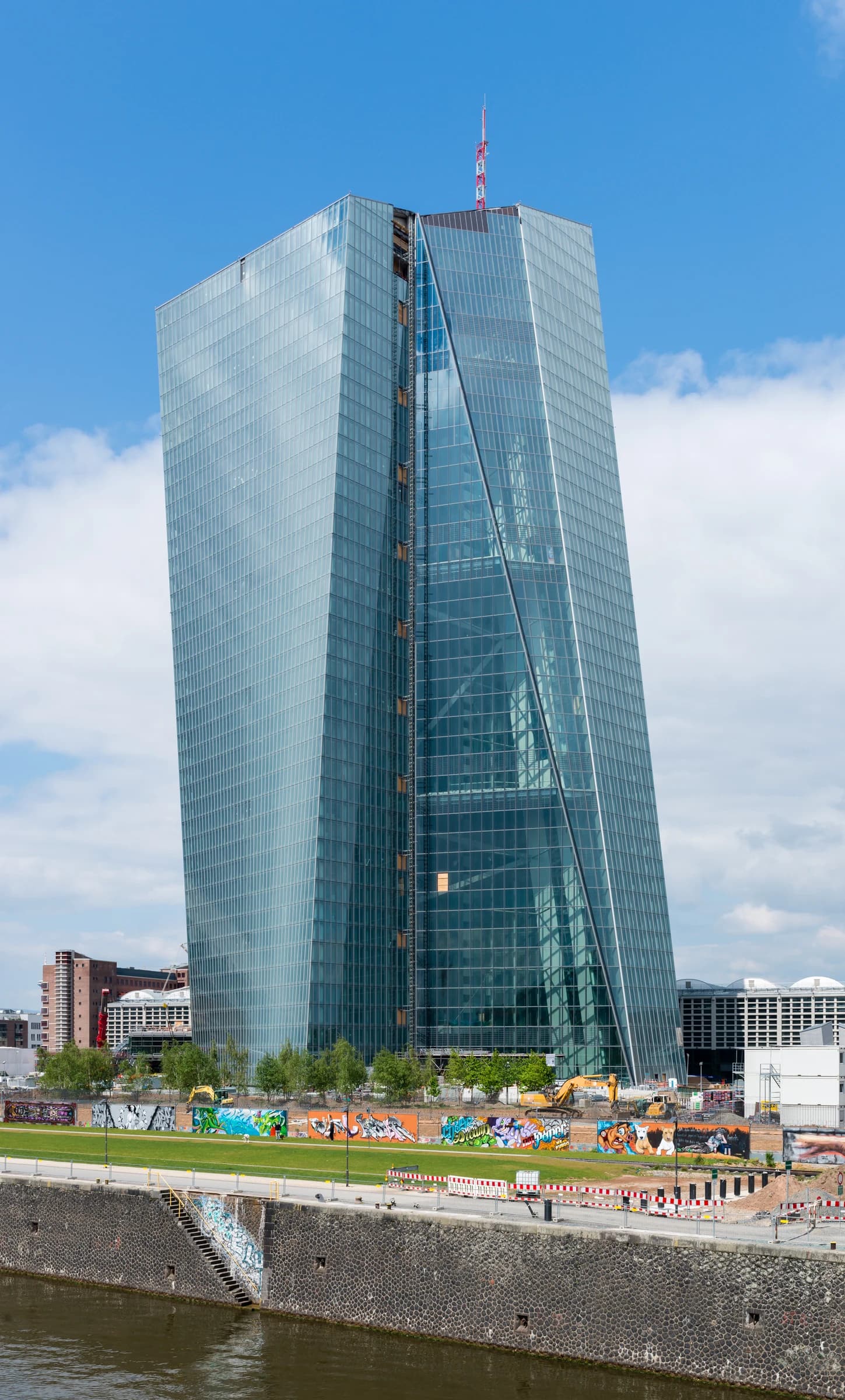 The glass facade of the European Central Bank building in Frankfurt, Germany.