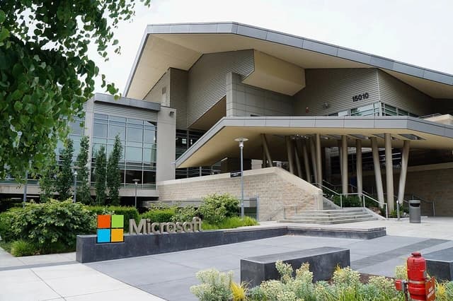 Exterior view of Building 92 at Microsoft's Redmond Campus, with the company logo.