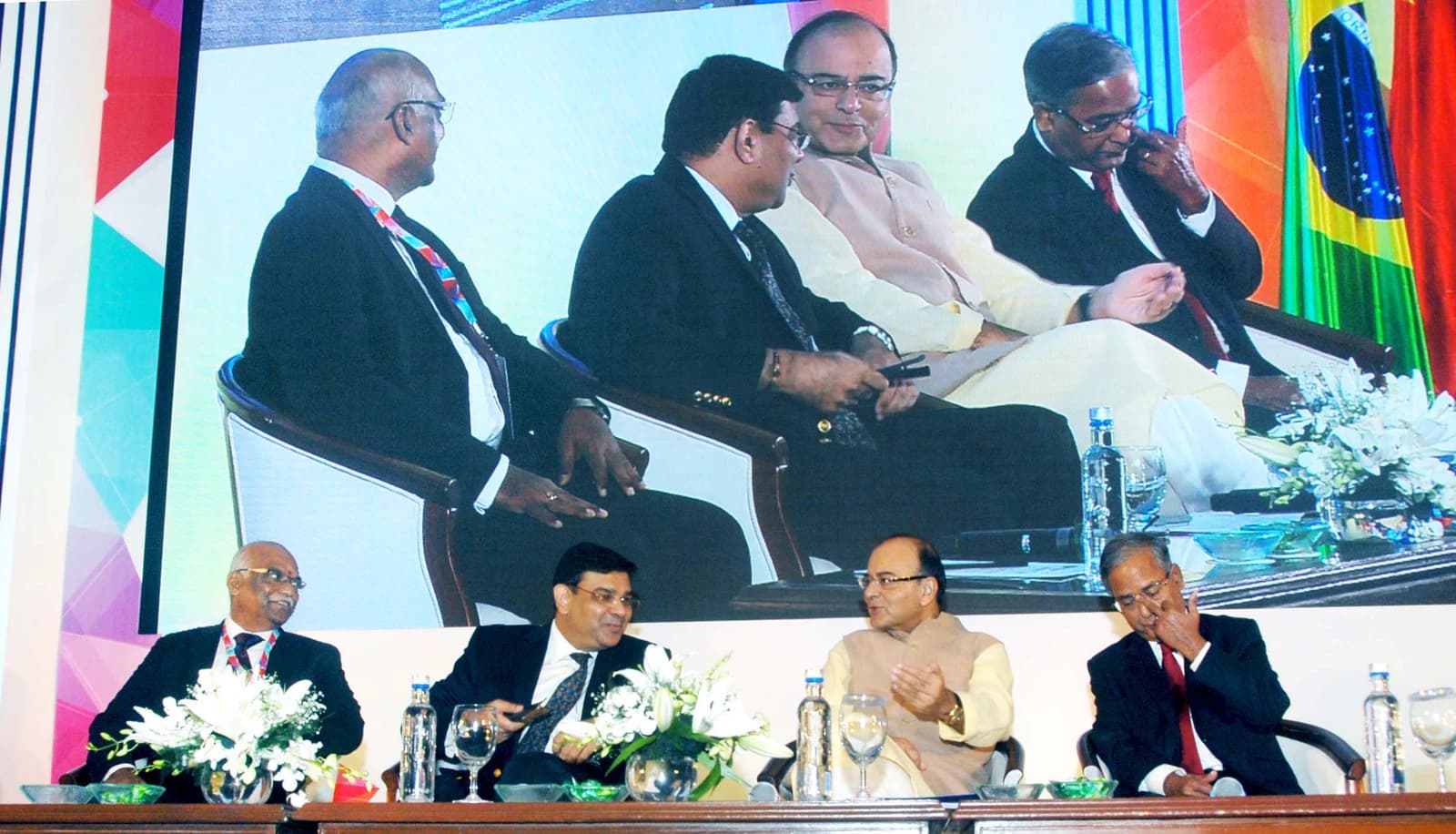 Arun Jaitley, Indian Minister of Finance, speaking at a conference with other financial officials.