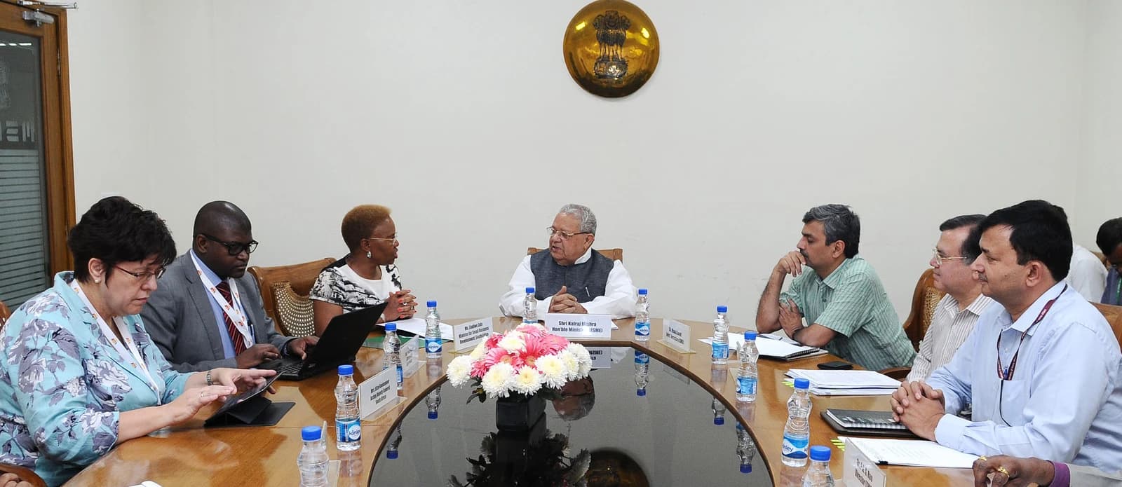 Ms. Lindiwe Zulu and Shri Kalraj Mishra meeting at a conference table in New Delhi.