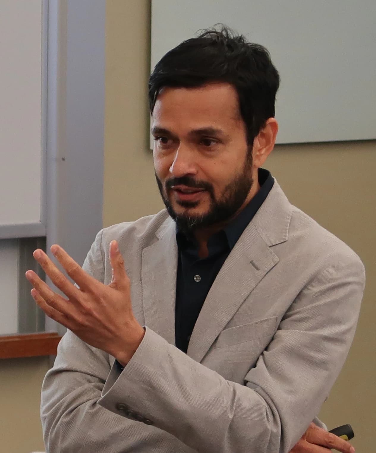 Deepak Hegde, Professor of Management at NYU Stern School of Business, speaking at an event.