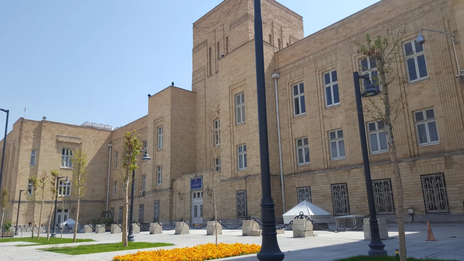 The Ministry of Foreign Affairs building in Iran, a large stone structure with many windows.