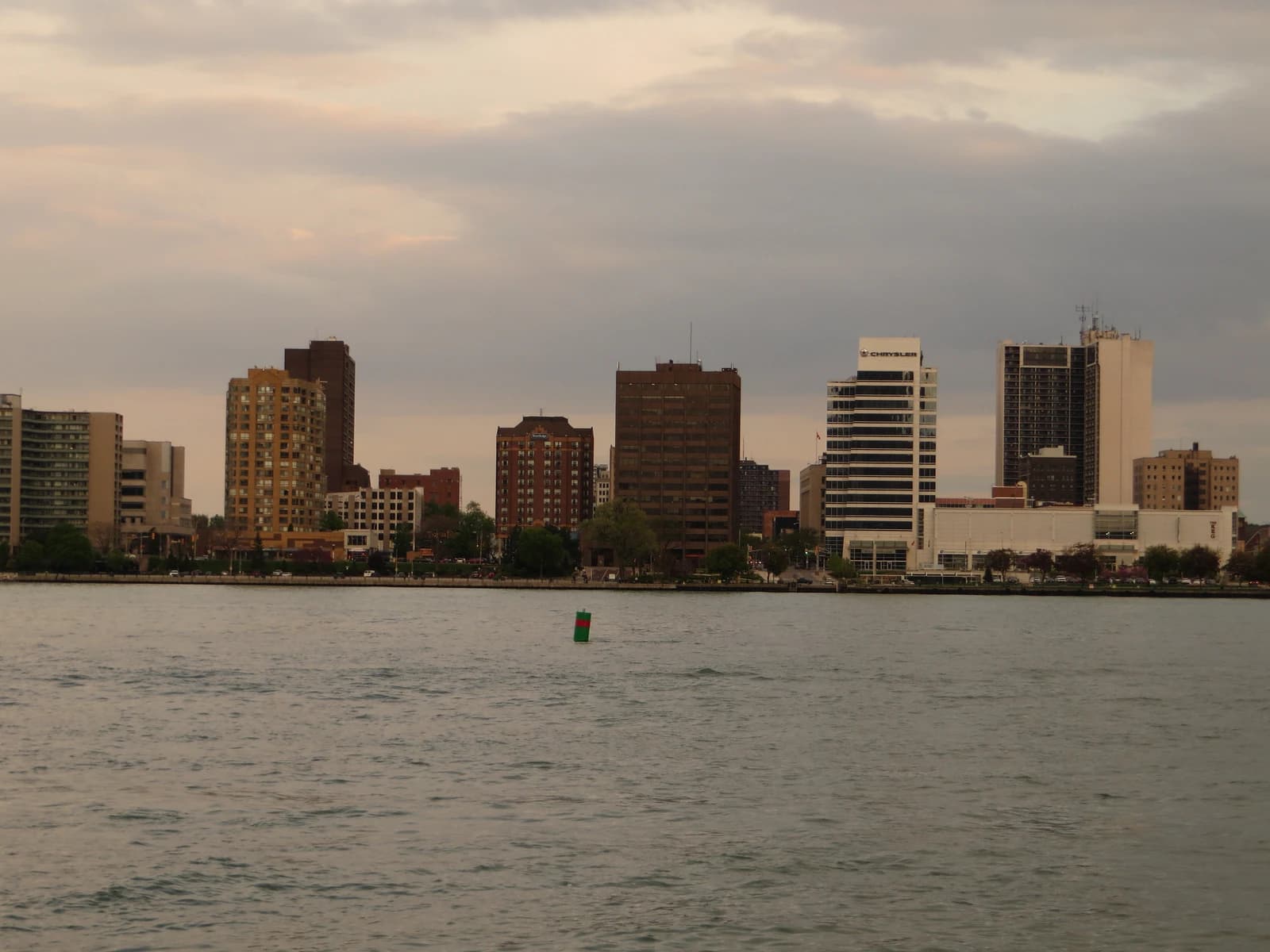 Buildings along the waterfront of Windsor, Ontario, across the Detroit River.