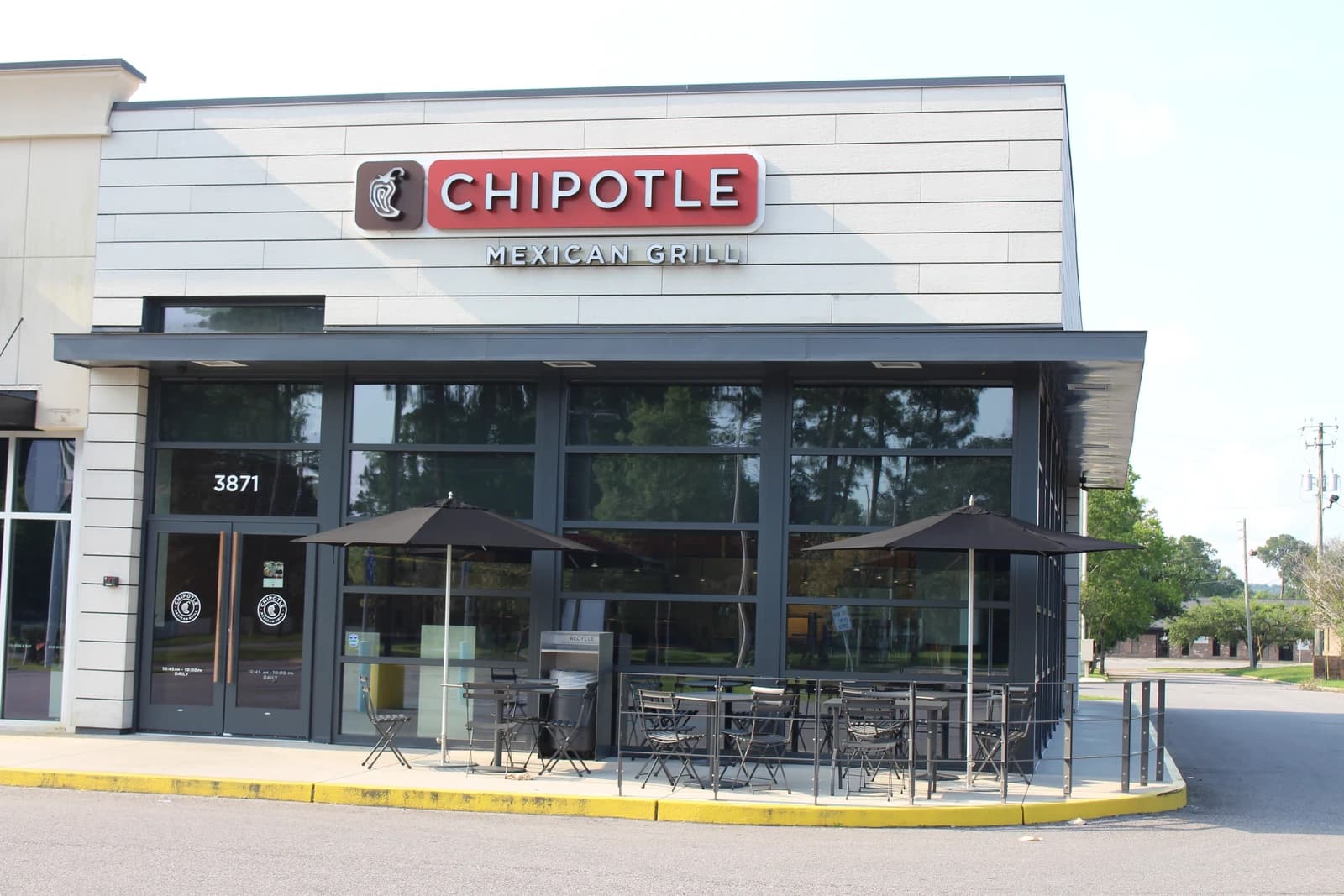 Exterior of a Chipotle Mexican Grill restaurant building with its prominent sign.