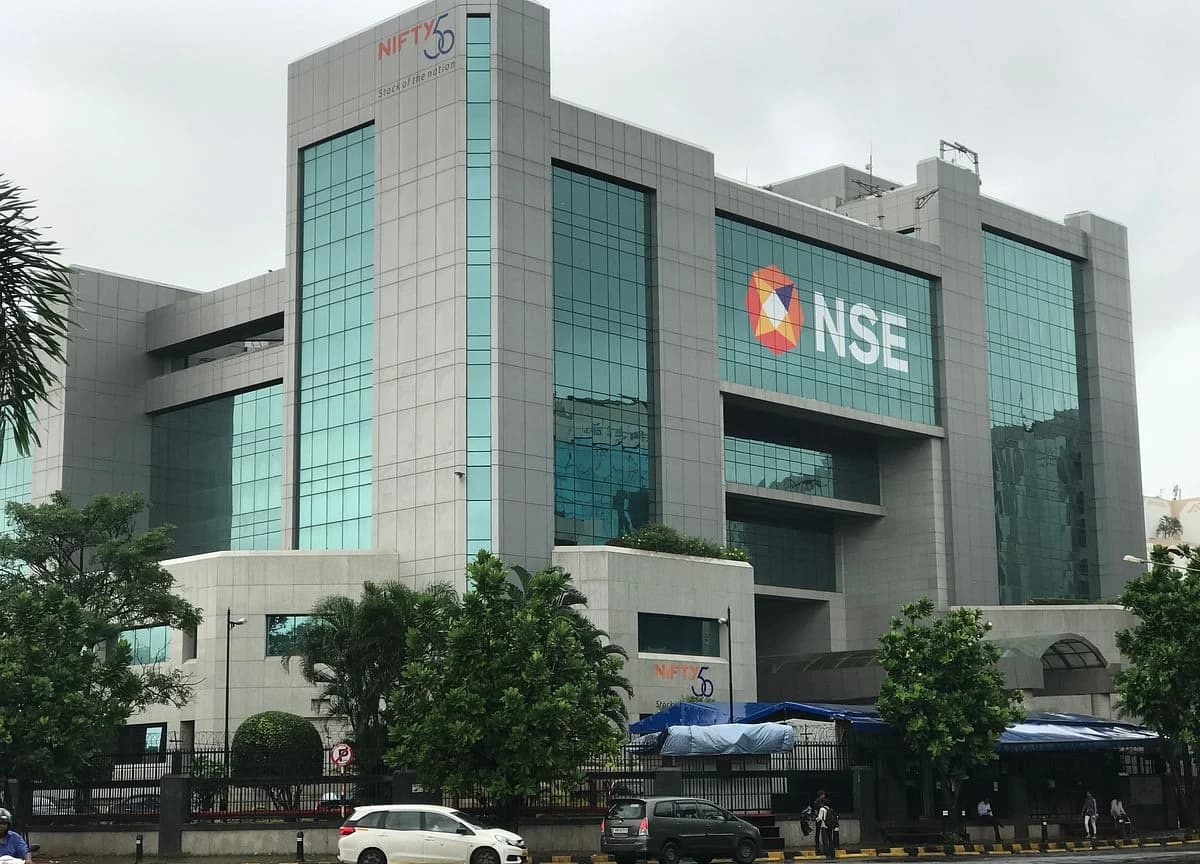 Modern glass and concrete building of the National Stock Exchange in Mumbai.