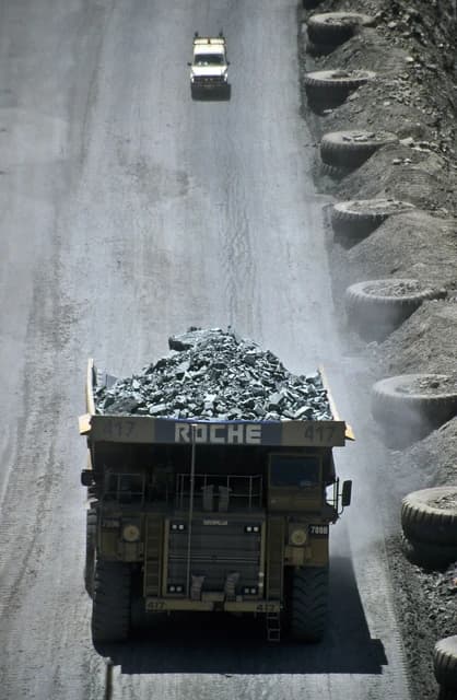 Loaded dump truck climbing a dirt road at the Super Pit Gold Mine in Kalgoorlie-Boulder.