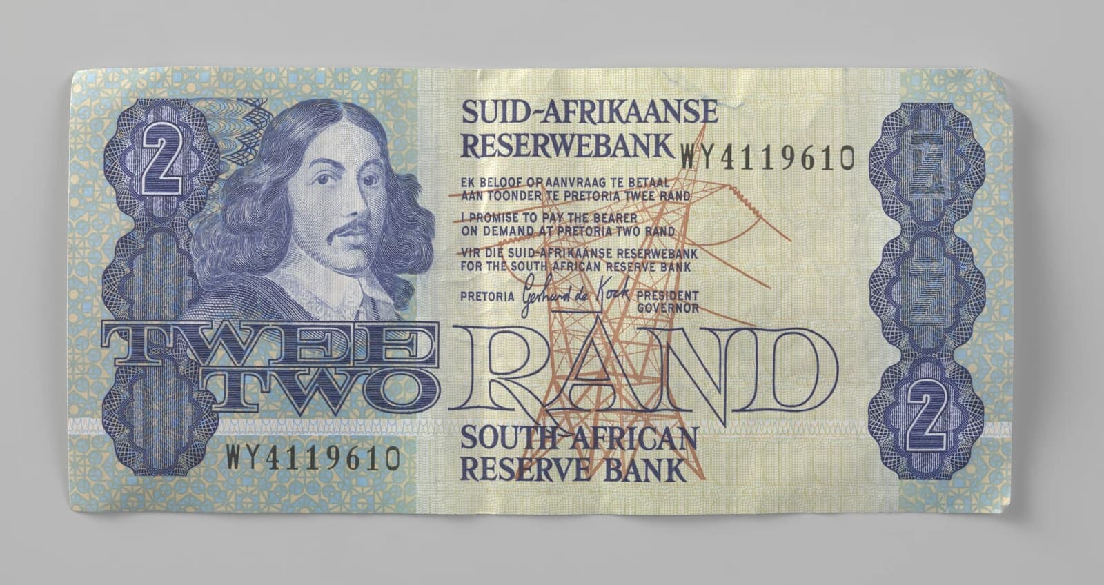 Banknote of two South African rand, featuring a portrait and text in Afrikaans and English.