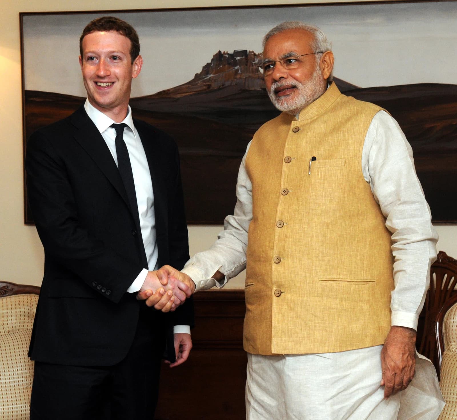Mark Zuckerberg, CEO of Meta, shaking hands with Indian Prime Minister Narendra Modi.