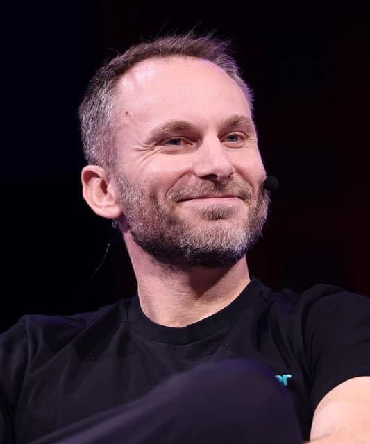 Paolo Ardoino, Chief Technology Officer of Tether, speaking at an event.