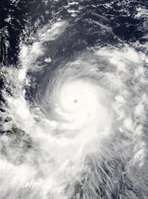 Satellite image of Typhoon Sepat, a large swirling mass of clouds over ocean.