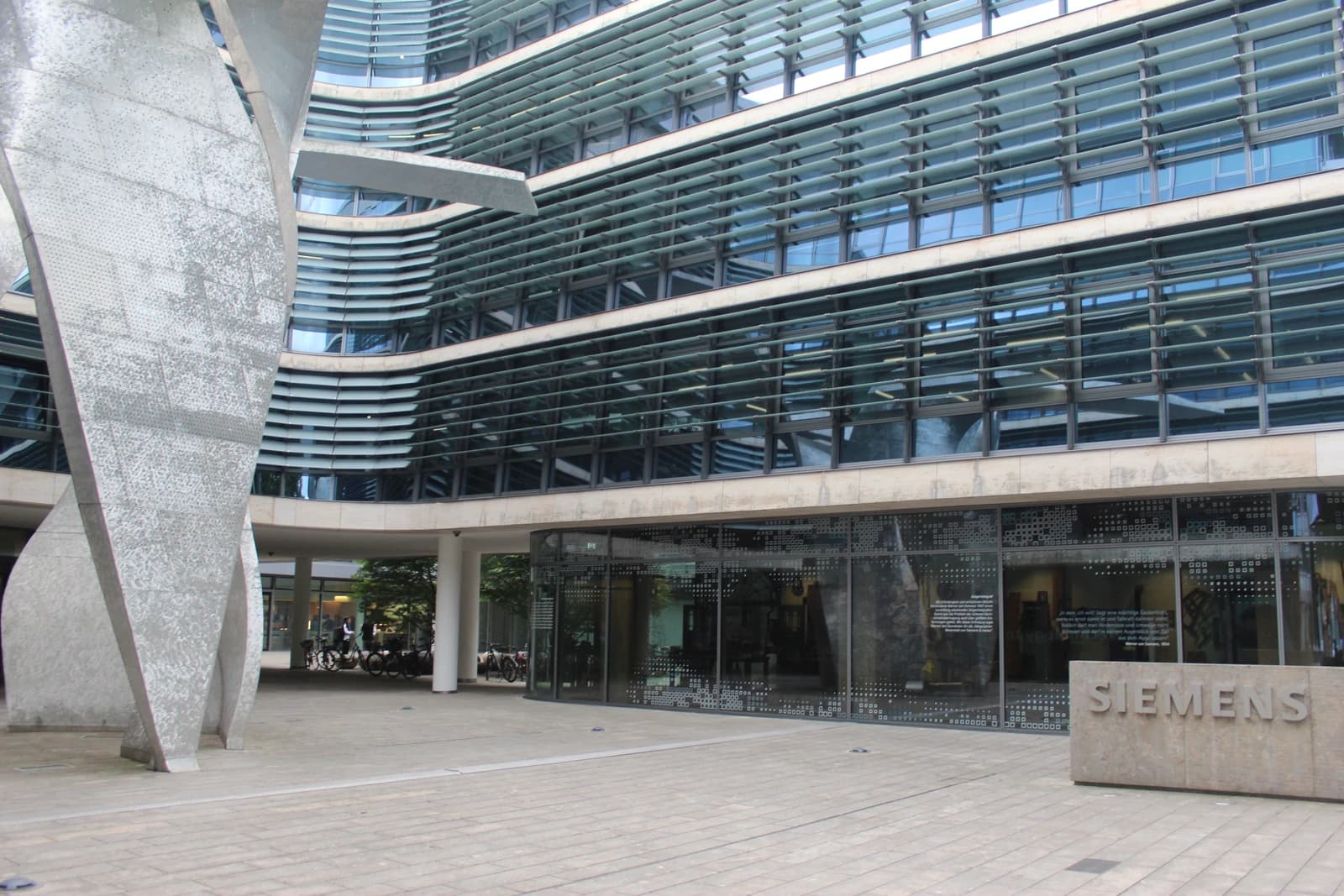 The Siemens AG corporate headquarters building in Munich, Germany, on a clear day.