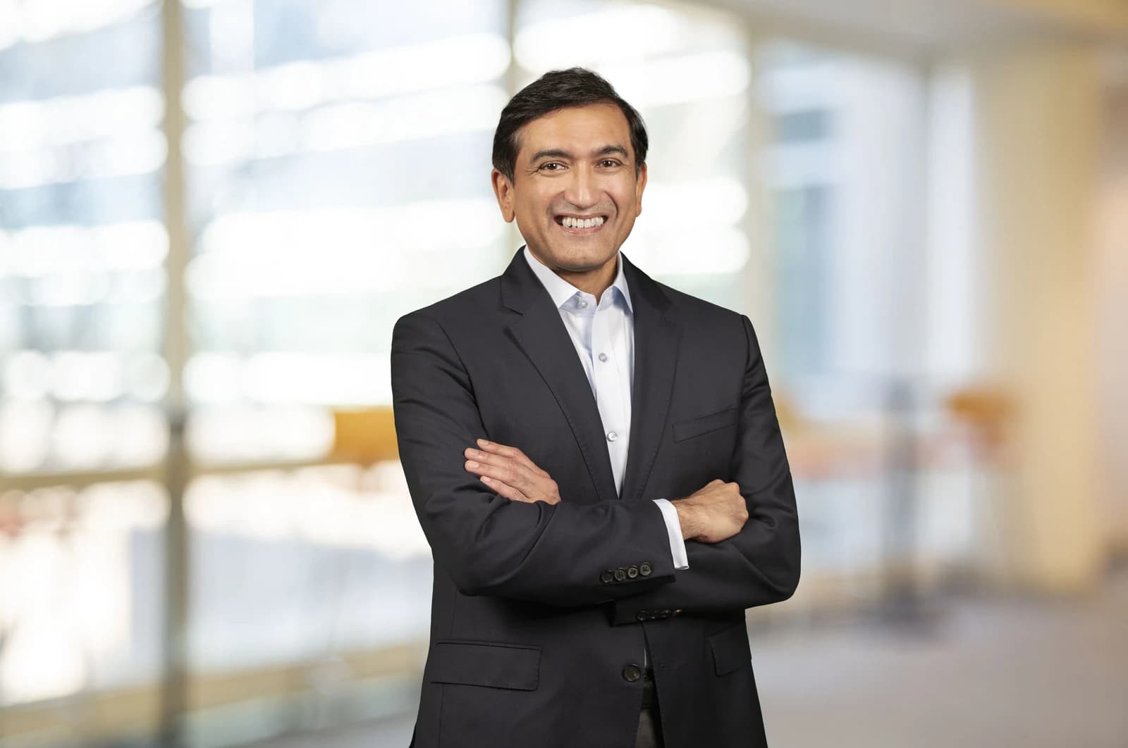 Shailesh Jejurikar, Procter & Gamble's Chief Operating Officer, poses with arms crossed.
