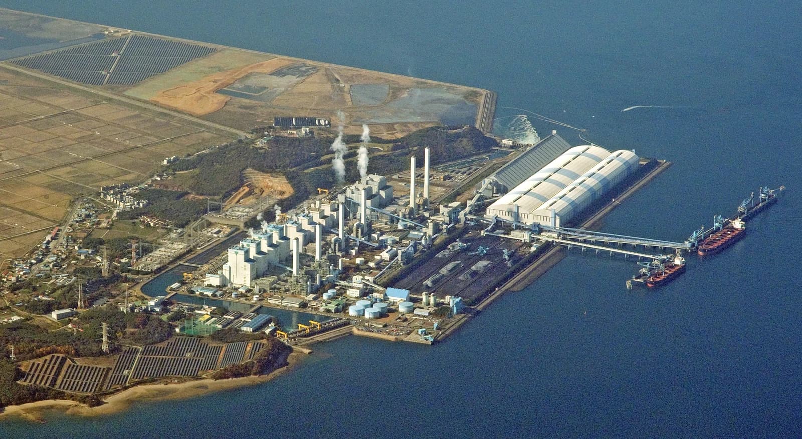 Aerial view of Dangjin Thermal Power Plant and surrounding landscape in South Korea.