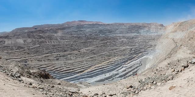 Chuquicamata copper mine in Calama, Chile, showing terraced landscape of extraction.