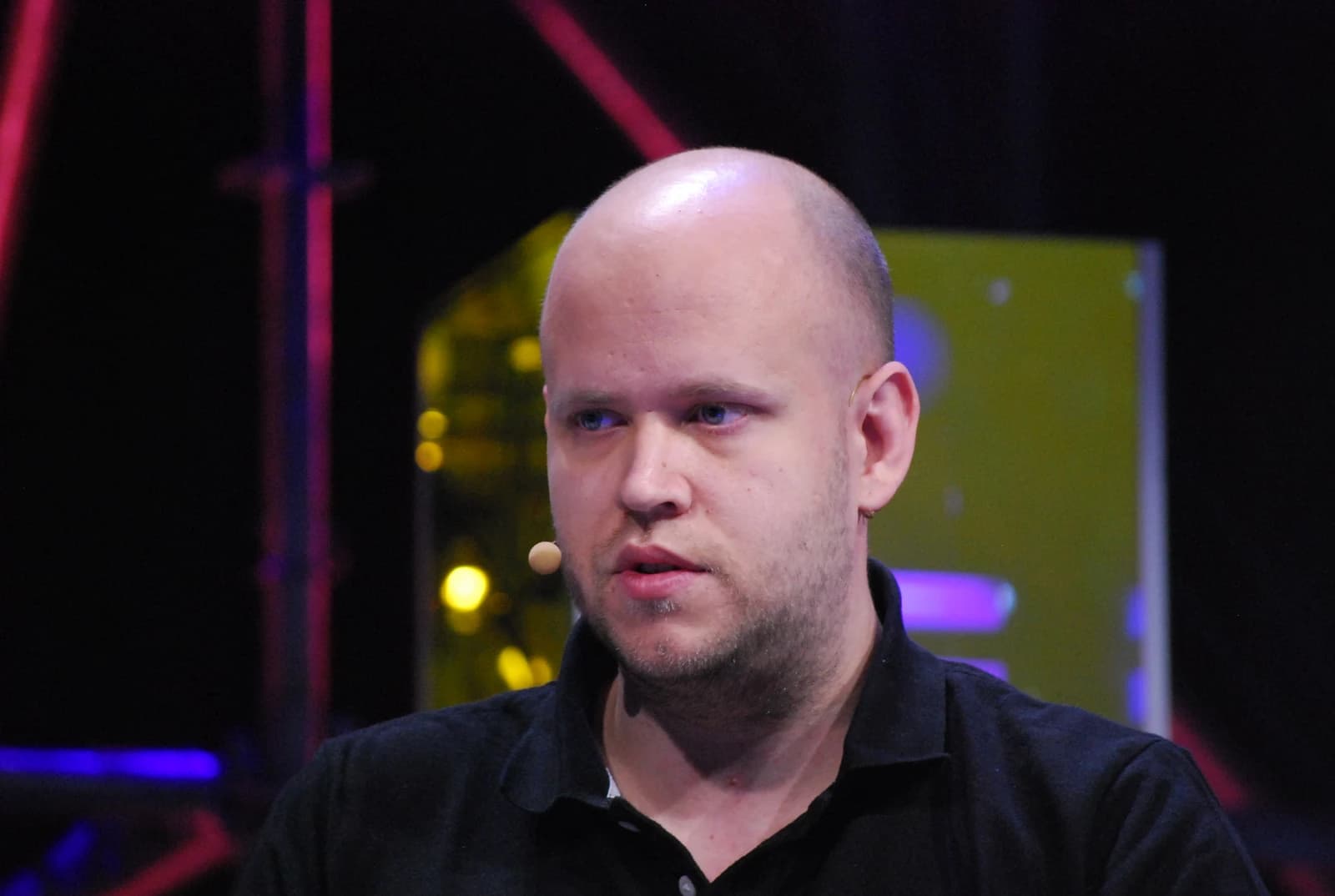 Daniel Ek, CEO of Spotify, speaking into a microphone.